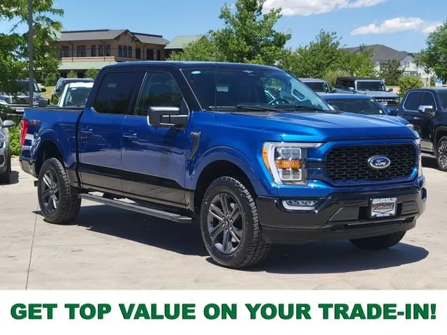 2023 Ford F-150 XLT in Atlas Blue Metallic — front three-quarter view