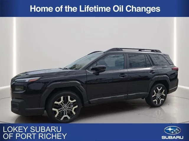 2026 Subaru Outback Touring XT in Crystal Black Silica — front three-quarter view