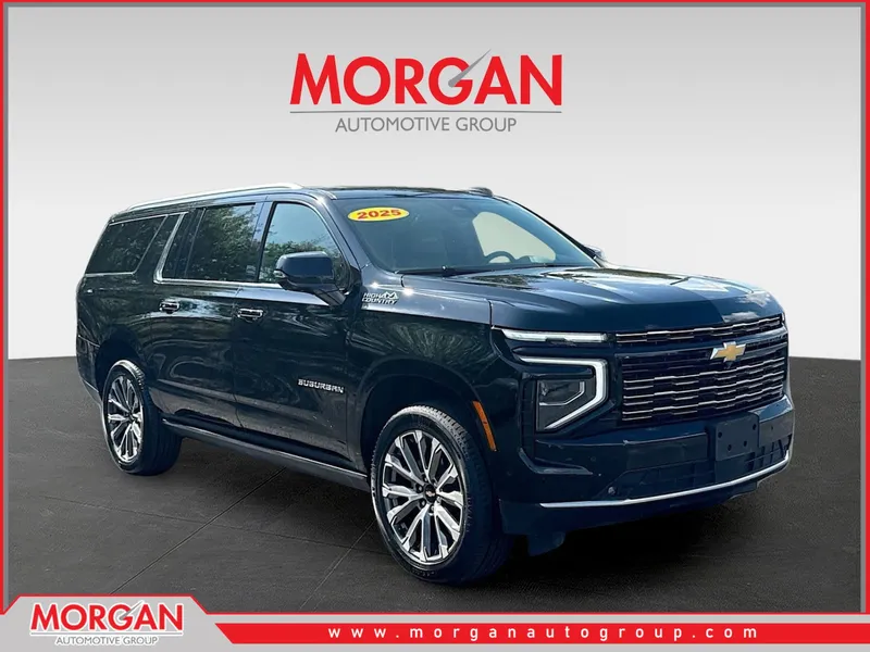 2025 Chevrolet Suburban High Country in Black — front three-quarter view