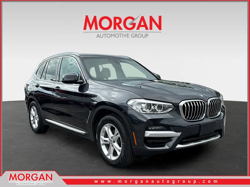 2020 BMW X3 xDrive30i in Dark Graphite Metallic — front three-quarter view