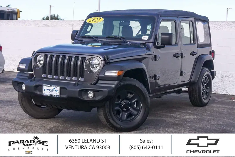 2022 Jeep Wrangler Unlimited Sport in Granite Crystal M — front three-quarter view