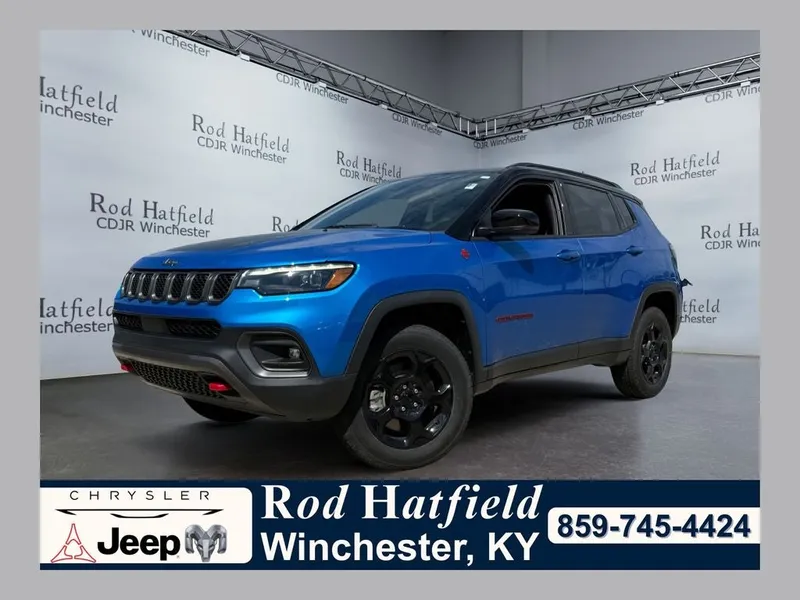 2023 Jeep Compass Trailhawk 4x4 in Laser Blue Pearlcoat — front three-quarter view