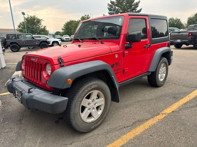 2017 Jeep Wrangler Sport in Firecracker Red Clearcoat — front three-quarter view