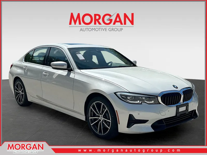 2021 BMW 3 Series 330i xDrive in Mineral White Metallic — front three-quarter view