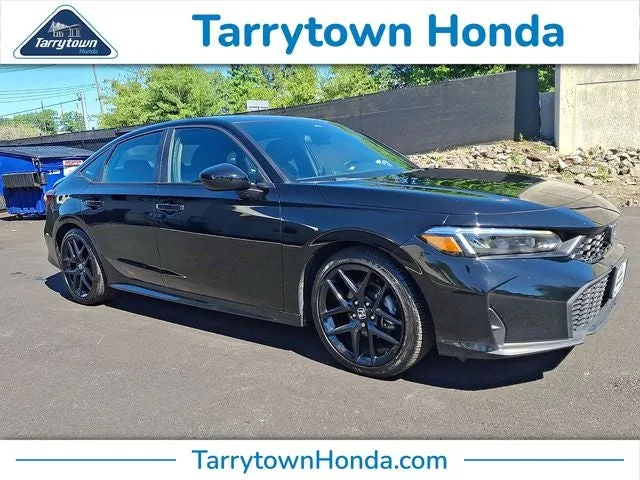 2025 Honda Civic Sport in Crystal Black Pearl — front three-quarter view