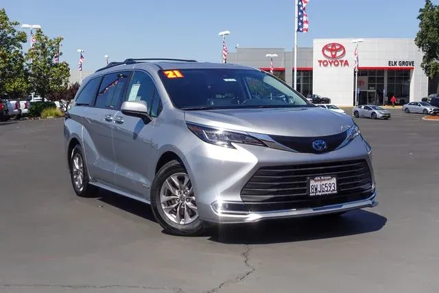2021 Toyota Sienna XLE in Silver — front three-quarter view