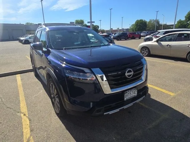 2023 Nissan Pathfinder SL in Deep Ocean Blue Pearl — front three-quarter view