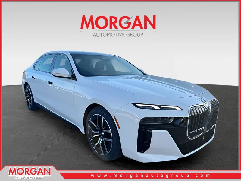 2025 BMW 7 Series 740i in Alpine White — front three-quarter view
