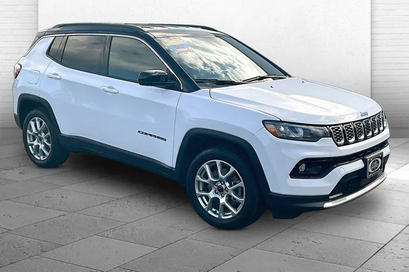 2025 Jeep Compass Limited in Bright White Clea — front three-quarter view