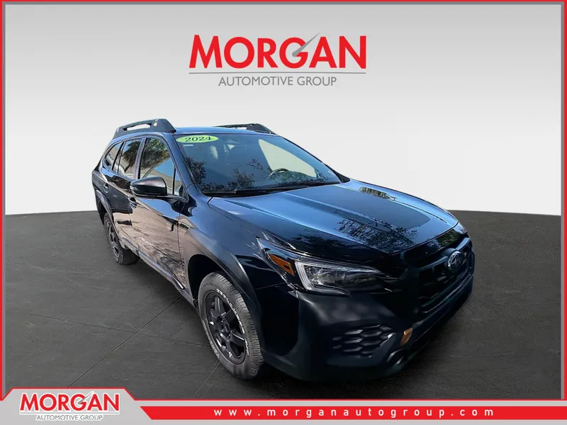 2024 Subaru Outback Wilderness in Crystal Black Silica — front three-quarter view