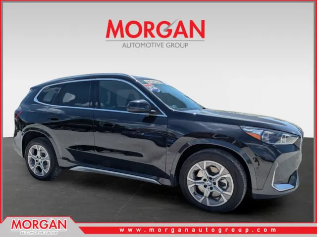 2026 BMW X1 xDrive28i in Black Sapphire Metallic — front three-quarter view