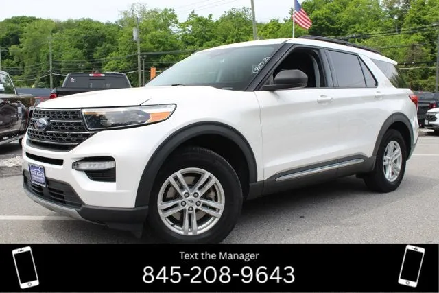 2021 Ford Explorer XLT in White — front three-quarter view