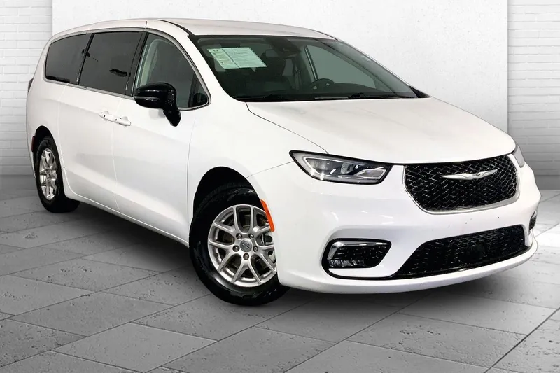 2024 Chrysler Pacifica Touring L in Bright White Clea — front three-quarter view