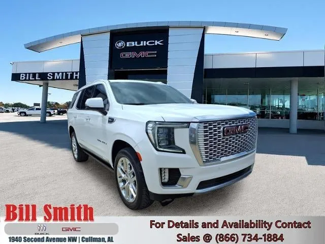 2023 GMC Yukon Denali in Summit White — front three-quarter view