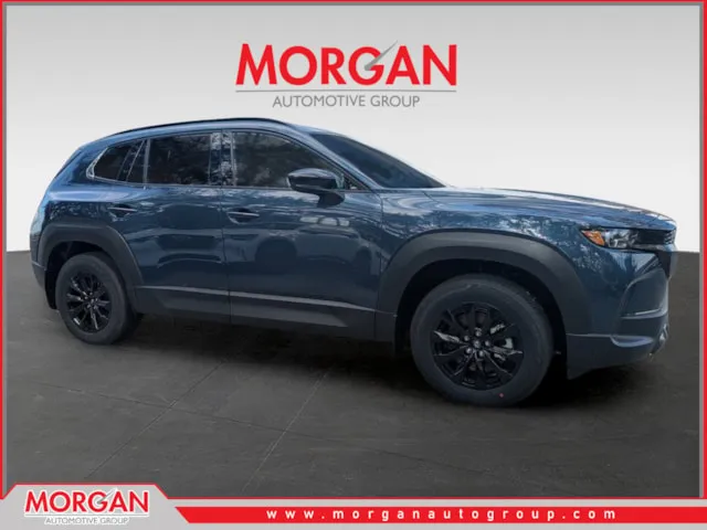 2026 Mazda CX-50 Hybrid Premium in Ingot Blue Metallic — front three-quarter view