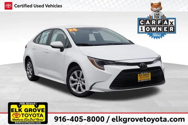 2024 Toyota Corolla LE in White — front three-quarter view