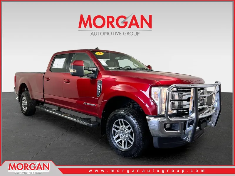 2019 Ford F-350SD Lariat in Ruby Red Metallic Tinted Clearcoat — front three-quarter view