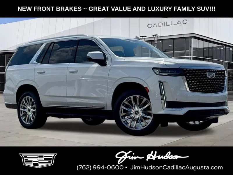 2021 Cadillac Escalade Premium Luxury in Crystal White — front three-quarter view