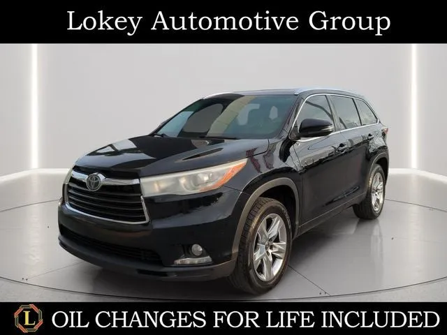 2016 Toyota Highlander Limited Platinum V6 in Midnight Black Metallic — front three-quarter view
