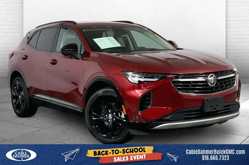 2023 Buick Envision Preferred in Cinnabar Metallic — front three-quarter view