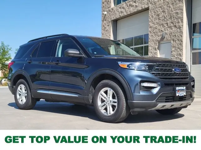 2023 Ford Explorer XLT in Blue Metallic — front three-quarter view