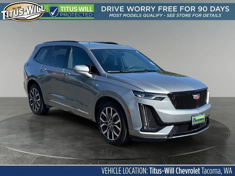 2024 Cadillac XT6 Sport in Argent Silver Metallic — front three-quarter view