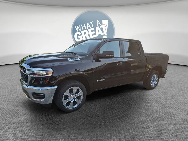 2025 RAM 1500 Big Horn/Lone Star in Diamond Black Crystal Pearlcoat — front three-quarter view