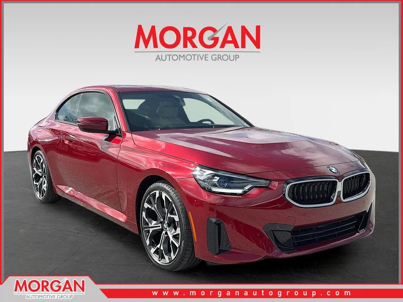 2026 BMW 2 Series 230i in Vegas Red Metallic — front three-quarter view