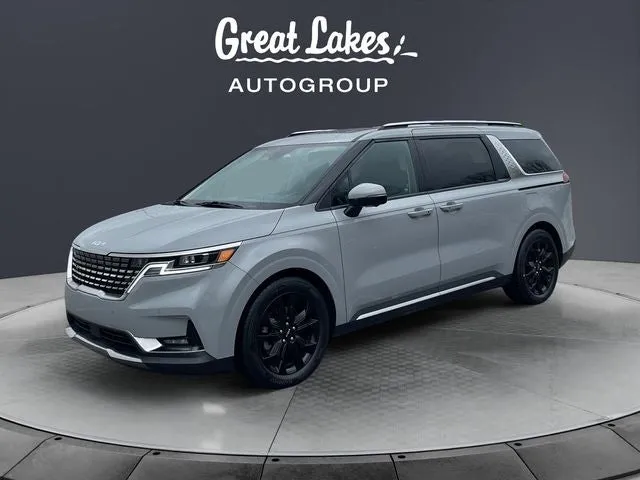 2023 Kia Carnival SX Prestige in Silky Silver — front three-quarter view