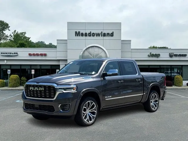 2026 RAM 1500 Tungsten in Granite Crystal Metallic Clear-Coat Exterior Paint — front three-quarter view
