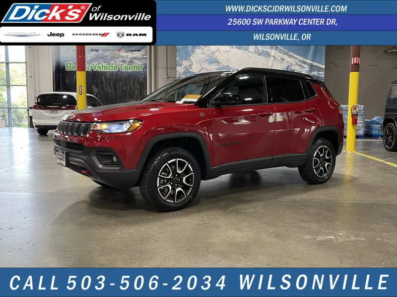 2025 Jeep Compass Trailhawk in Red Hot Pearlcoat — front three-quarter view