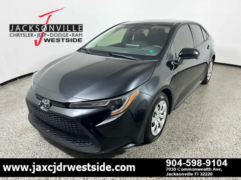 2022 Toyota Corolla LE in Black Sand Pearl — front three-quarter view