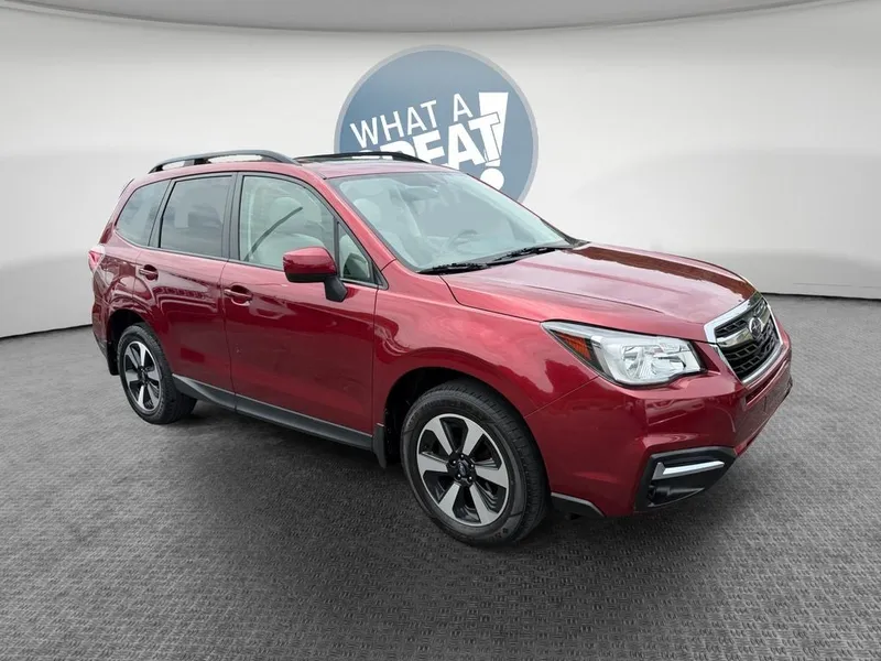 2018 Subaru Forester 2.5i Premium in Red Metallic — front three-quarter view
