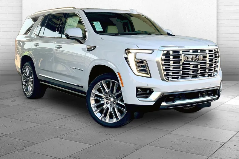 2026 GMC Yukon Denali in Glacier White Tricoat — front three-quarter view