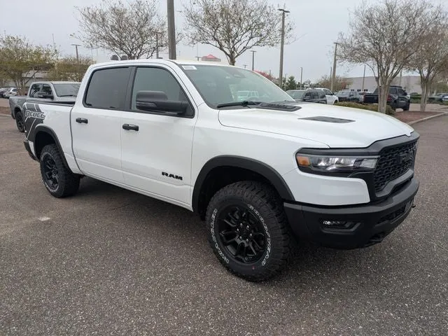 2026 RAM 1500 Rebel in Bright White Clear-Coat Exterior Paint — front three-quarter view