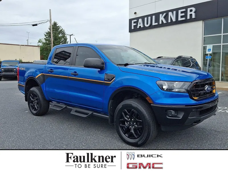 2022 Ford Ranger XLT in Velocity Blue Metallic — front three-quarter view