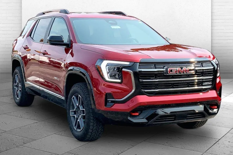 2026 GMC Terrain AT4 in Volcanic Red Tintcoat — front three-quarter view