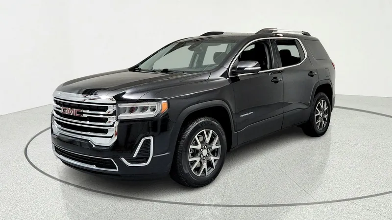 2021 GMC Acadia SLE in Ebony Twilight Metallic — front three-quarter view