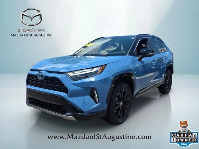 2023 Toyota RAV4 Hybrid XSE in Blue — front three-quarter view