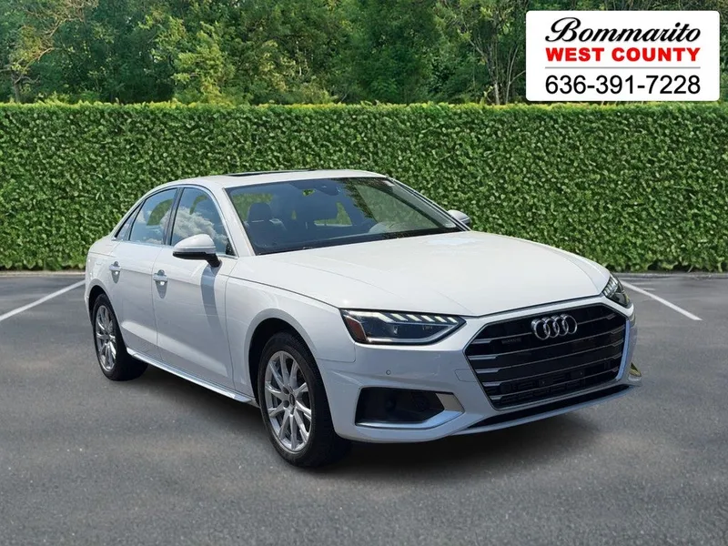 2023 Audi A4 Sedan Premium 40 TFSI quattro in Glacier White Metallic — front three-quarter view