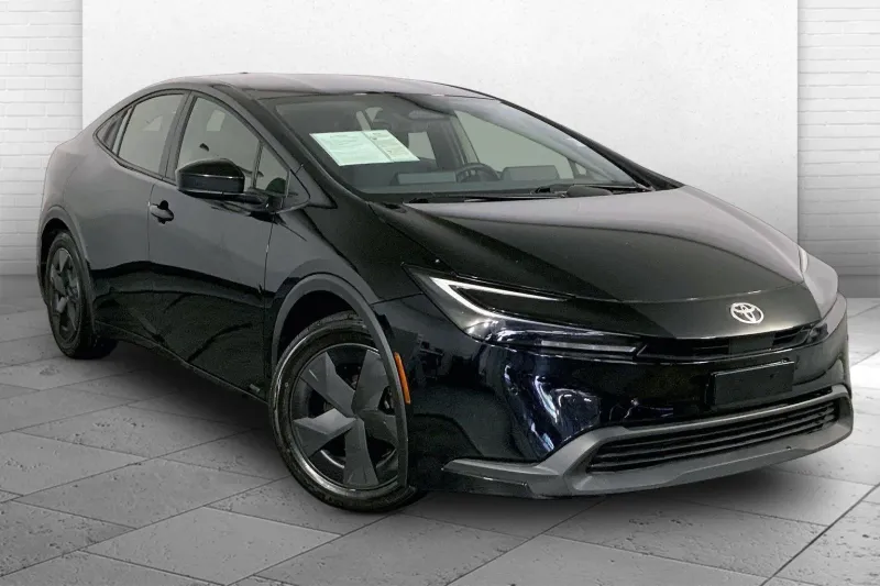 2025 Toyota Prius LE — front three-quarter view
