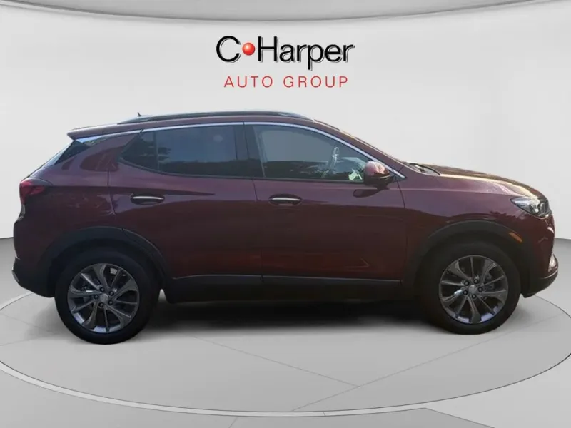 2023 Buick Encore GX Essence in Cinnabar Metallic — front three-quarter view