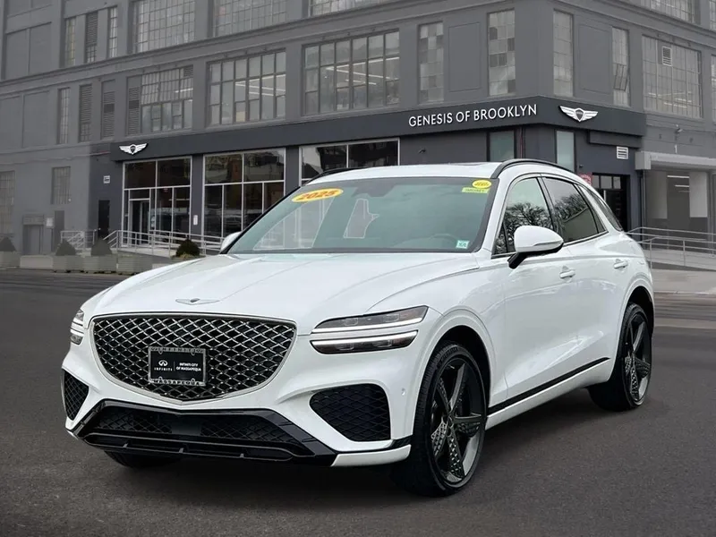 2025 Genesis GV70 3.5T Sport in Alta White — front three-quarter view
