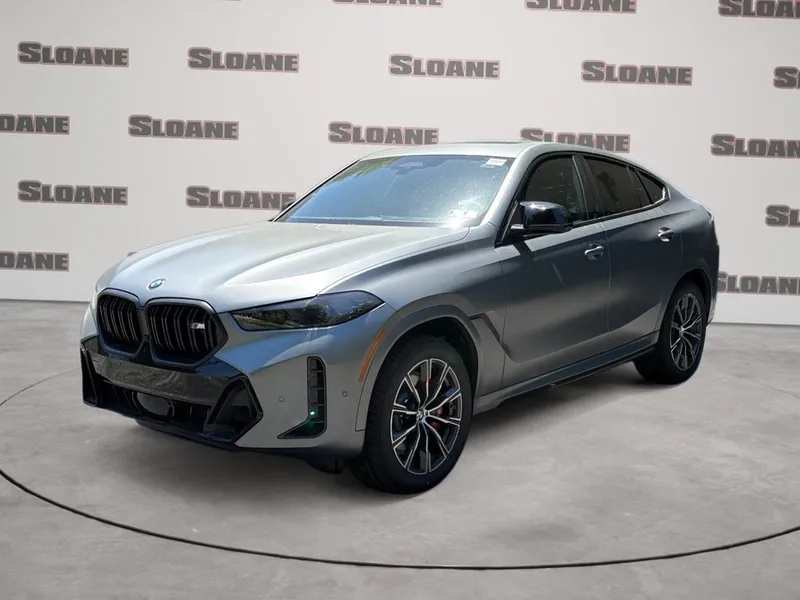 2027 BMW X6 M60i in Frozen Pure Grey Metallic — front three-quarter view