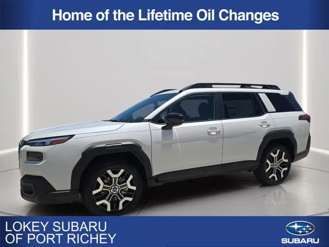 2026 Subaru Outback Touring XT in Crystal White Pearl — front three-quarter view