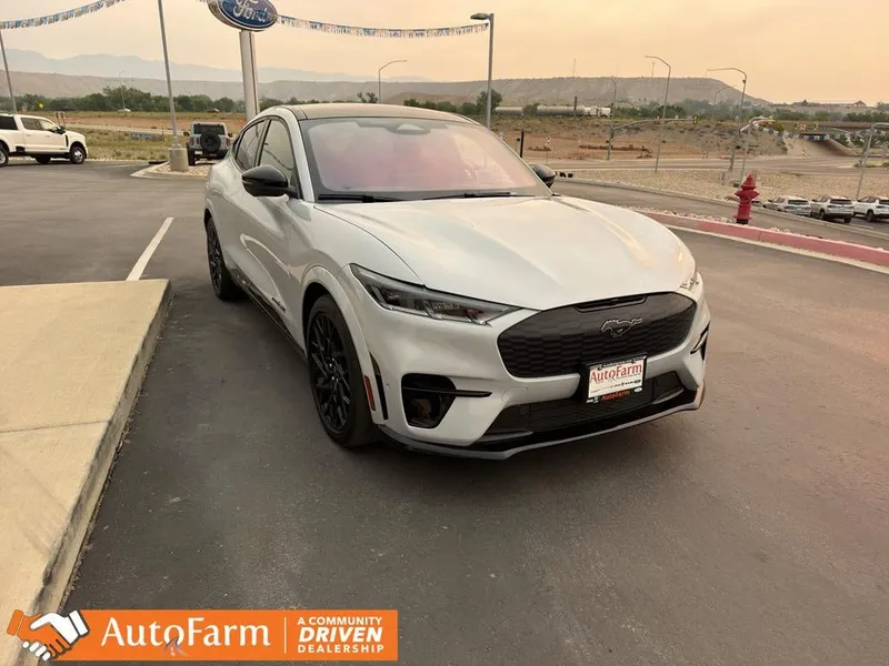 2023 Ford Mustang Mach-E GT in Space White Metallic — front three-quarter view