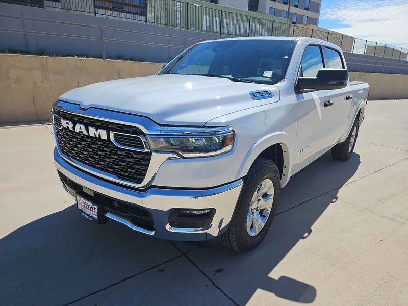 2025 RAM 1500 Big Horn/Lone Star in Bright White Clearcoat — front three-quarter view