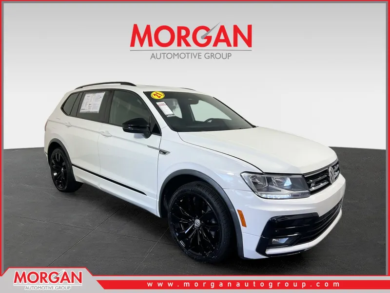 2021 Volkswagen Tiguan 2.0T SE R-Line Black in Pure White — front three-quarter view
