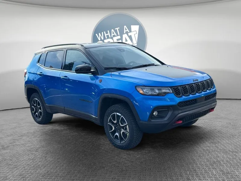 2026 Jeep Compass COMPASS TRAILHAWK 4X4 in Hydro Blue Pearl-Coat Exterior Paint — front three-quarter view
