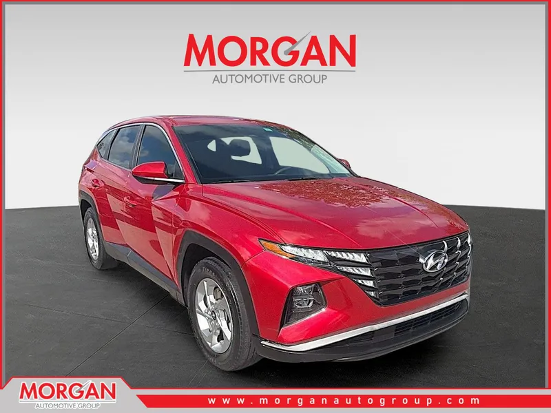2022 Hyundai Tucson SE in Calypso Red — front three-quarter view